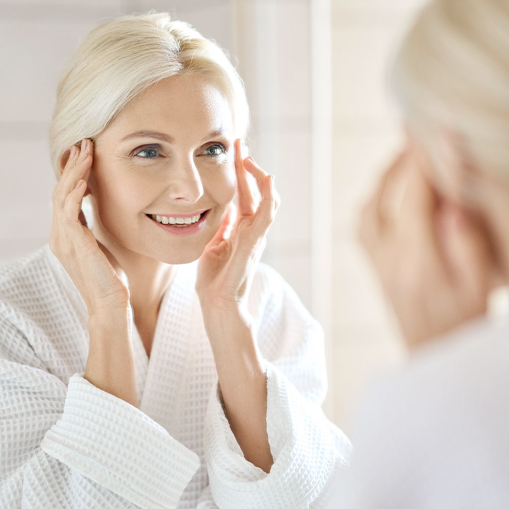 white woman in mirror